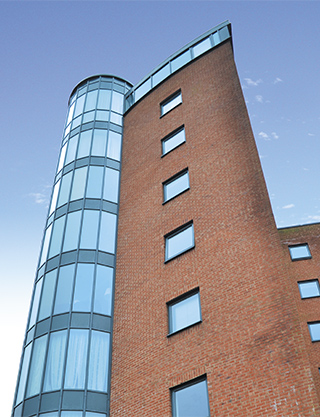 high rise offices under a blue sky